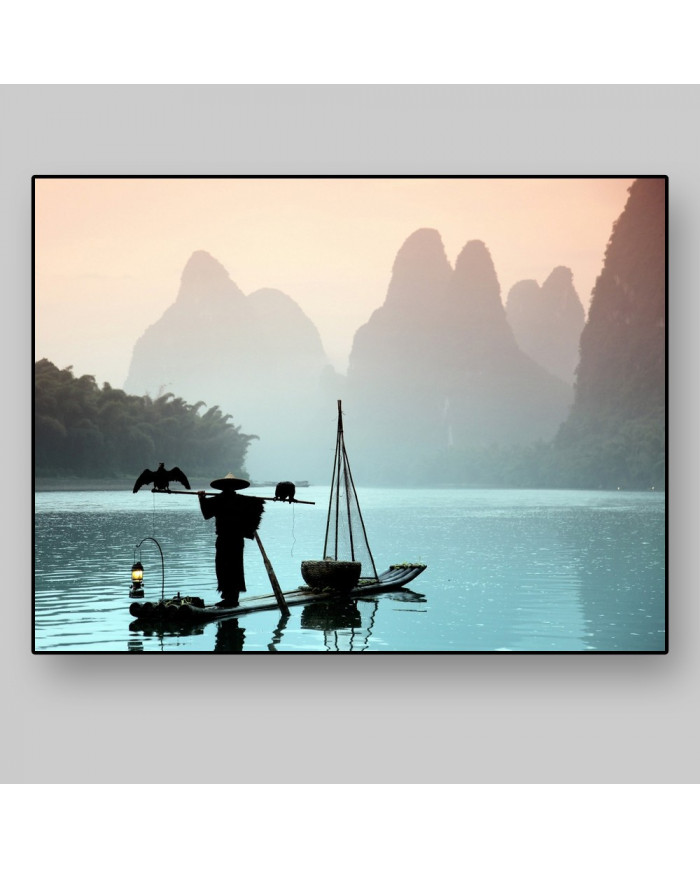 Pescador chino con un cormorán, China