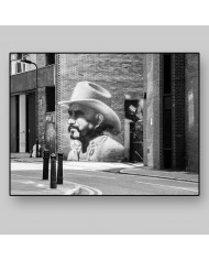 Graffiti de un cowbow en Hewlett Street, Londres, UK