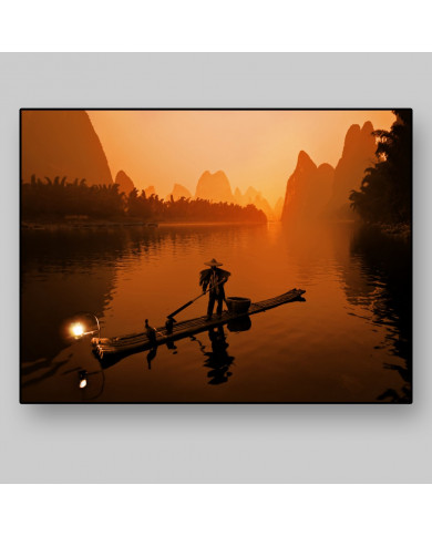 Pescador con cormoranes en el Río Li, China Pescador con cormoranes en el Río Li, China