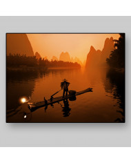Pescador con cormoranes en el Río Li, China