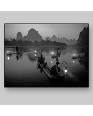 Pescador con cormoranes en el Río Li,China