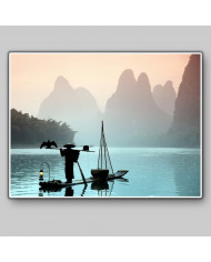 Pescador chino con un cormorán, China