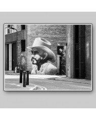 Graffiti de un cowbow en Hewlett Street, Londres, UK