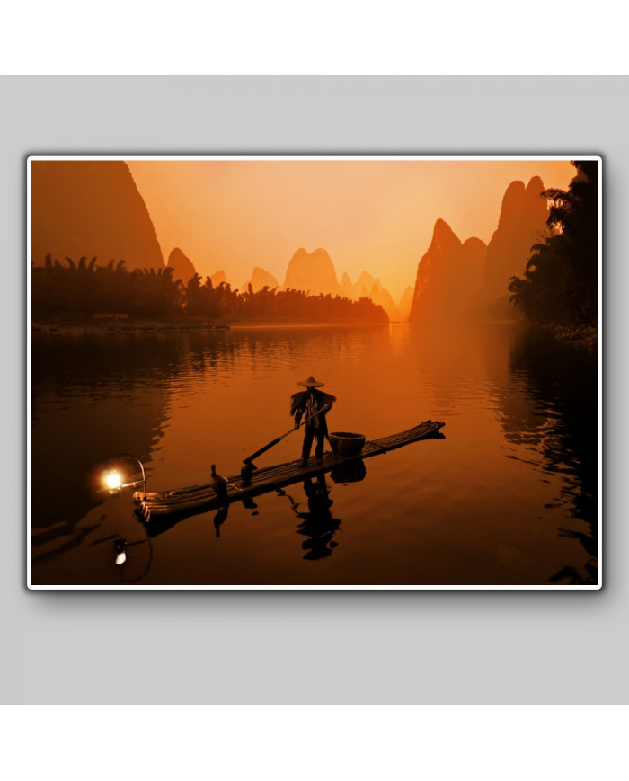 Pescador con cormoranes en el Río Li, China