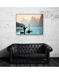 Pescador chino con un cormorán, China