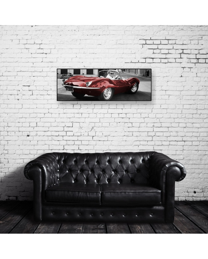 Steve Mcqueen conduciendo su Jaguar