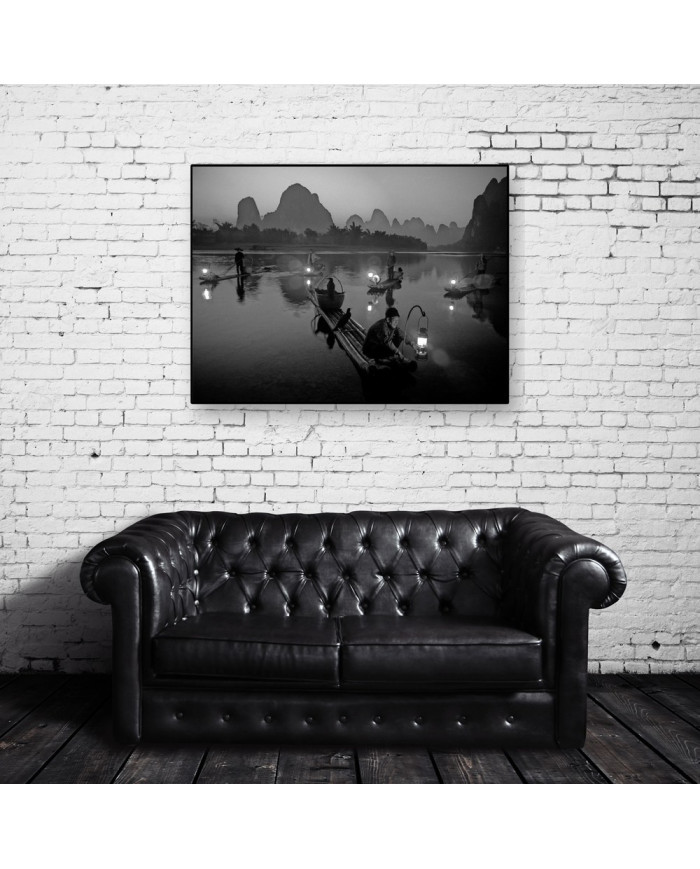 Pescador con cormoranes en el Río Li,China