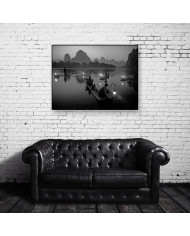 Pescador con cormoranes en el Río Li,China