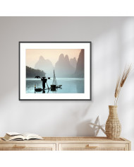 Pescador chino con un cormorán, China