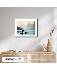 Pescador chino con un cormorán, China