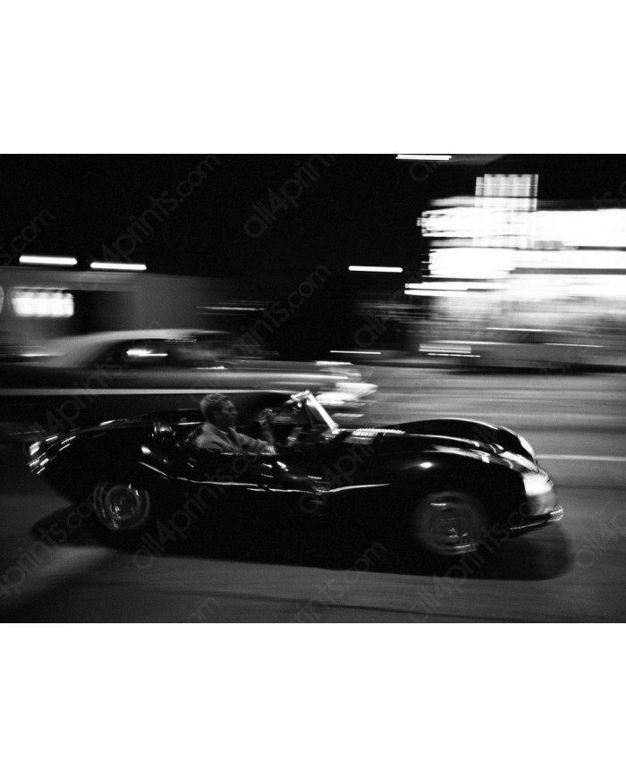Steve McQueen driving on Sunset Strip, 1963
