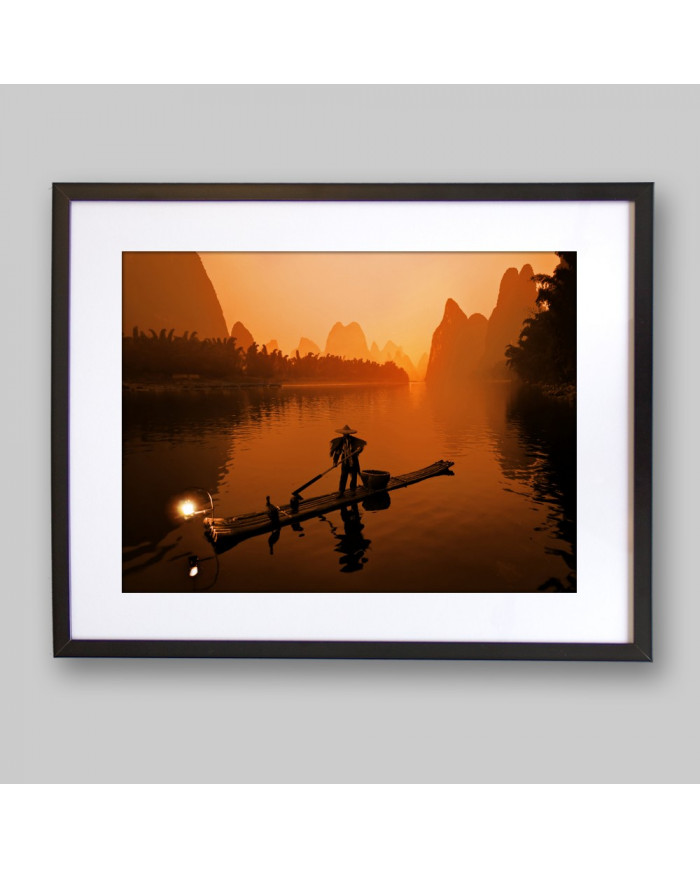 Pescador con cormoranes en el Río Li, China