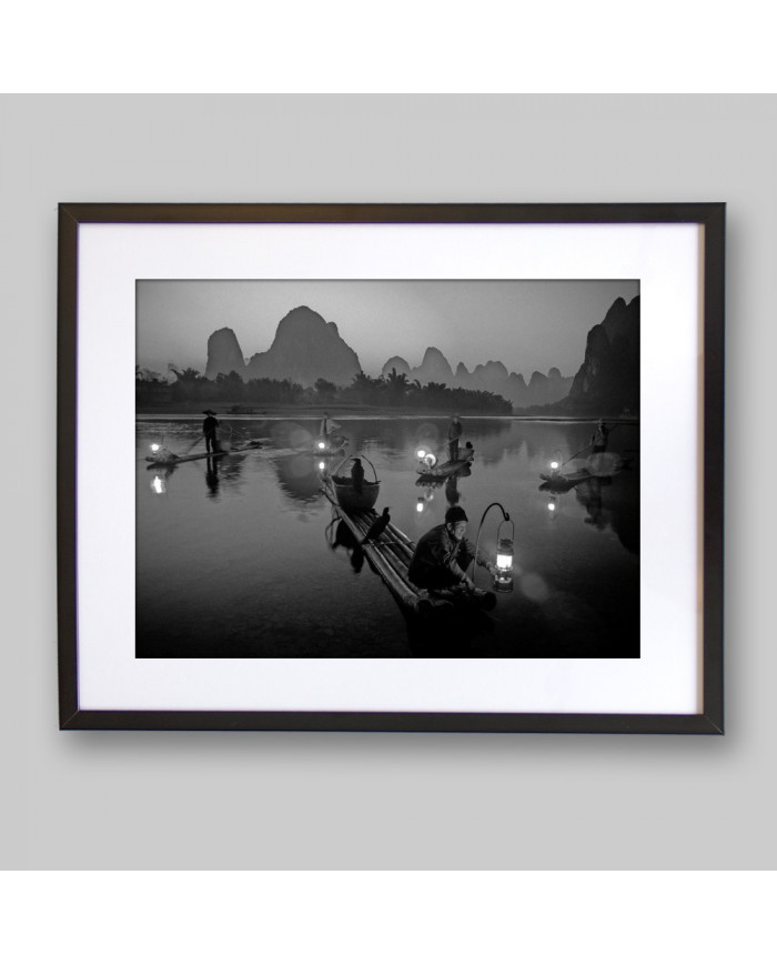 Pescador con cormoranes en el Río Li,China