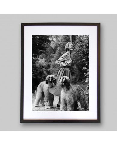 Woman with two afghans dogs,1957 Woman with two afghans dogs,1957