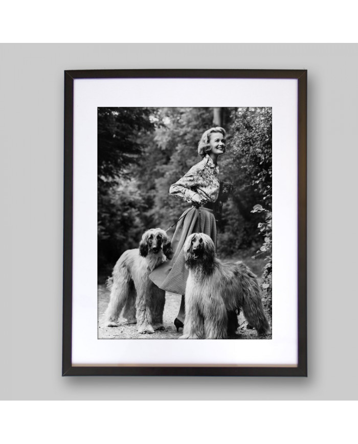 Woman with two afghans dogs,1957