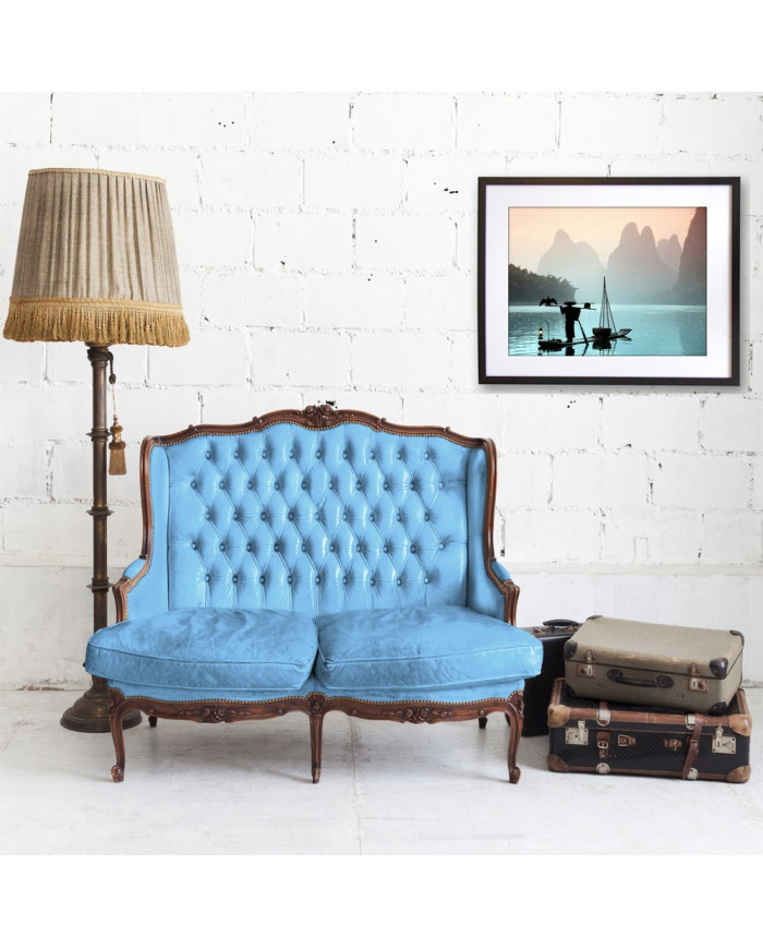 Pescador chino con un cormorán, China